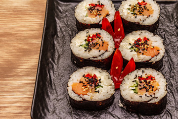 Korean roll Gimbap(kimbob). Steamed white rice (bap) and various other ingredients