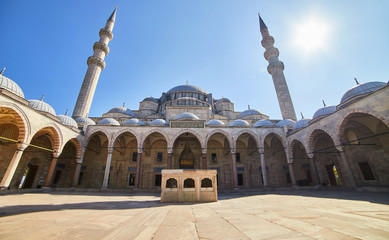 Courtyard of the old great Suleymaniye Mosque in Istanbul, Turkey is a famous landmark of the city. Magnificent Islamic Ottoman architecture.
