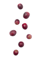 Falling red grapes isolated on white background with clipping path.