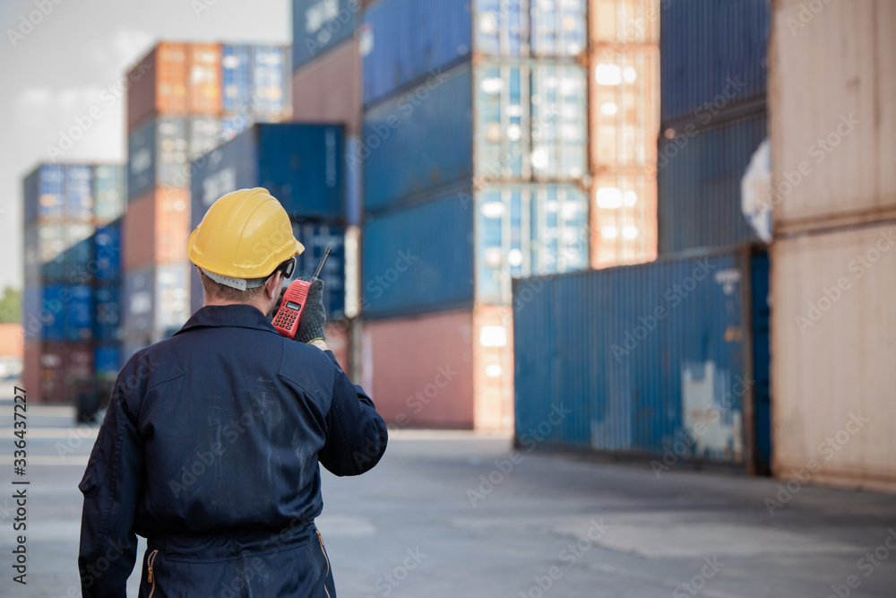 Poster foreman control loading containers box from cargo freight ship. business logistic concept, import an