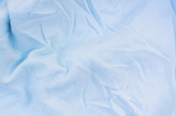 cloth texture and background with pastel light blue color.