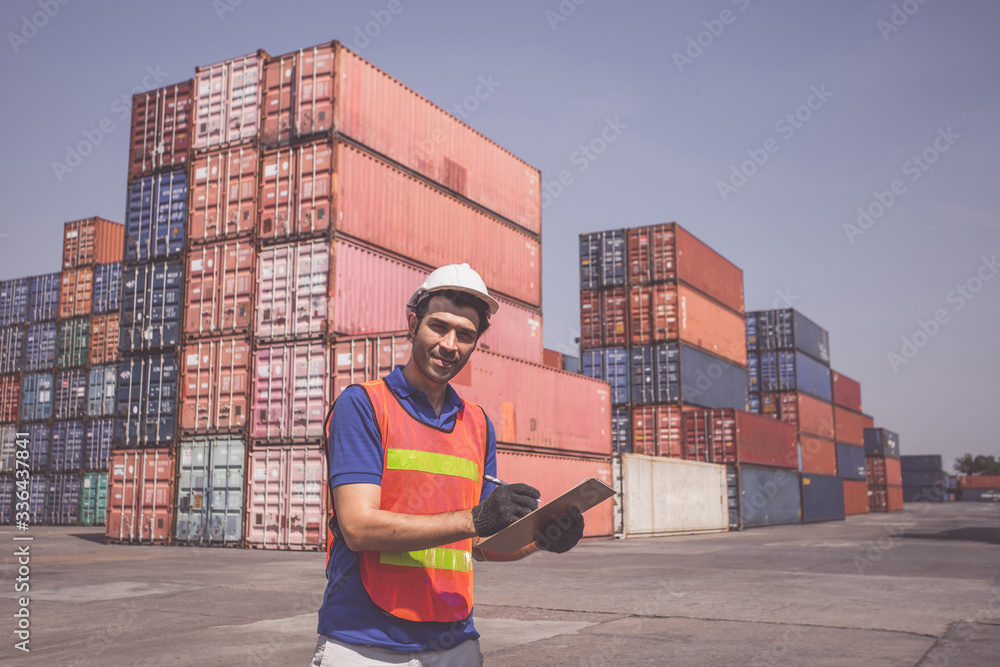 Poster foreman control loading containers box from cargo freight ship. business logistic concept, import an