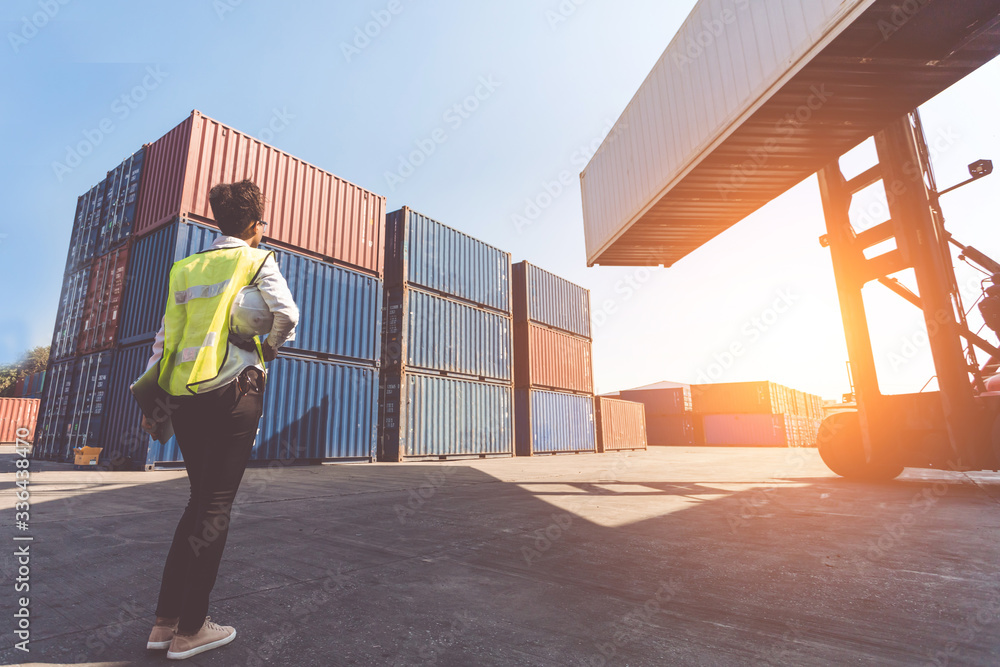 Poster foreman control loading containers box from cargo freight ship. business logistic concept, import an
