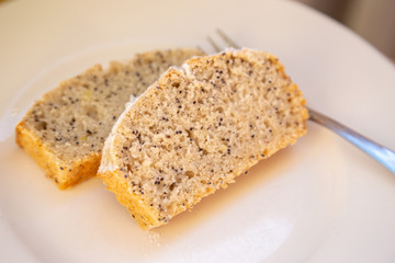 Slices of homemade vegan lemon poppy seed cake