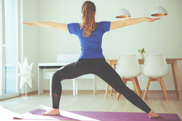 Yoga workout in selfisolation at home due to coronavirus quarantine