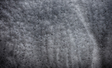 Surface pattern White bubbles in water and black shadows
