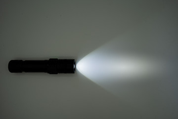 A flashlight on a white background