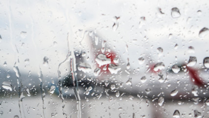 Rain on plane window low season bad for airline business