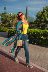 young woman walking on the street