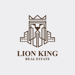 Obraz premium Lion King Real Estate Logo Design. Lion Estate Crown Vector. Building Lion Face Construction Logo Icon Graphic.