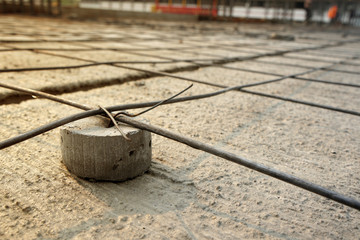 Concrete spacer for maintain the distance between the steel and the structure surface to the correct position. Concrete Covering. 