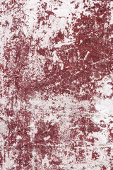 Abstract grunge texture of old red and white wall with peeled off paint. Creative background. Beautiful rough weathered stone texture. Vertical, copy space	