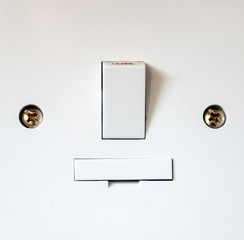 switch on wall looks like a face
