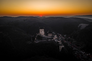 Karlstejn Castle is a large Gothic castle founded 1348 CE by Charles IV, Holy Roman Emperor-elect and King of Bohemia. There are hidden Czech crown jewels, holy relics, and other royal treasures.	
