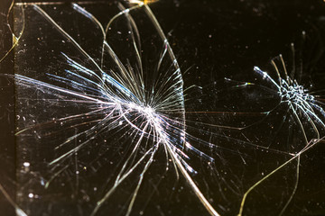Screen of the broken phone. Display broken screen, glass web.