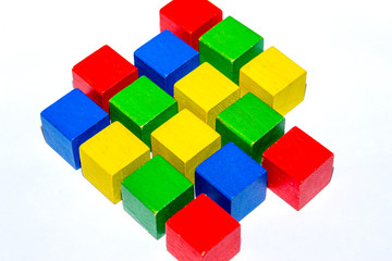 Colorful inexpensive cubes from an orphanage. Wooden cubes for orphaned children.