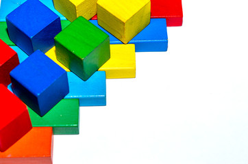 Colorful inexpensive cubes from an orphanage. Wooden cubes for orphaned children.