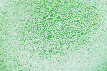 Green lather background, top view.