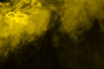 Yellow steam on a black background.