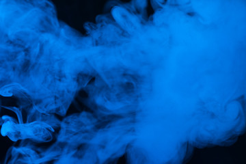 Blue steam on a black background.