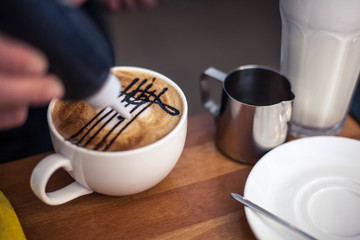 cup of coffee with a picture of latte art