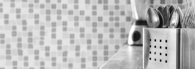 Inox iron stand with cutlery spoon and forks kitchen board in monochrome style