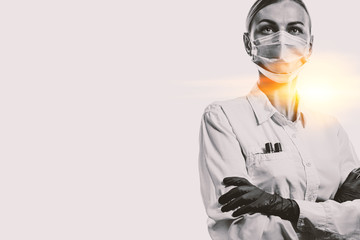 female doctor in medical mask on the face and gloves on a white background