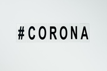 black hashtag corona  in the middle on white background