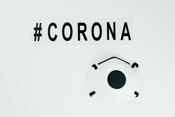 black hashtag corona and mask on white background