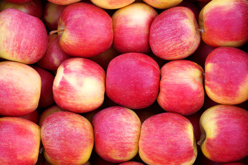 red apples on a market stall