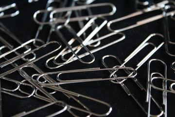 Fototapeta premium Steel paperclip wire clips stainless steel pressure forms