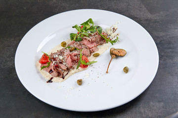 beef with celery puree and salad