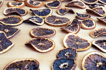 Dried oranges on the brown background