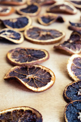 Dried oranges on the brown background