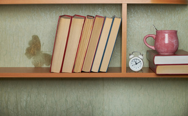 Education learning concept with opening book or textbook in old library, stack piles of literature...