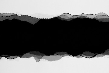 white torn paper on black background. collection paper rip