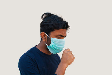 Young boy wearing hygienic mask to prevent the Corona virus
