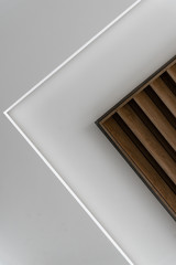 Obraz premium creative ceiling with wood paneling,modern wooden suspended ceiling,black loft lights in the ceiling,energy saving light bulbs