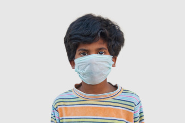 Portrait Of  Boy Wearing medical protective Mask
