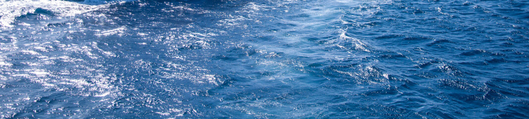 Playing sunlight on sea waves