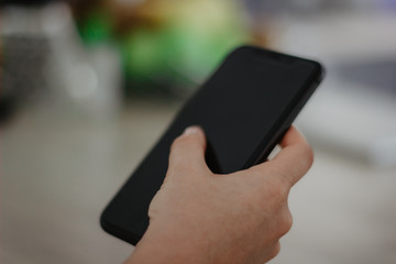 man using smartphone