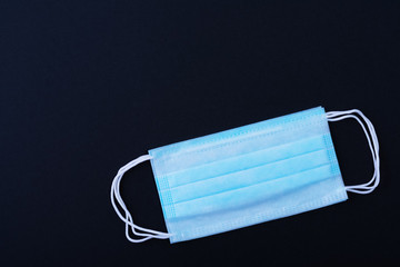 Medical mask protective virus, flu, disease. Isolated on a black background.