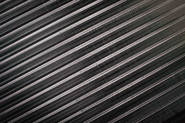 Closeup shot of car cooling radiator. High contrast vignette shot