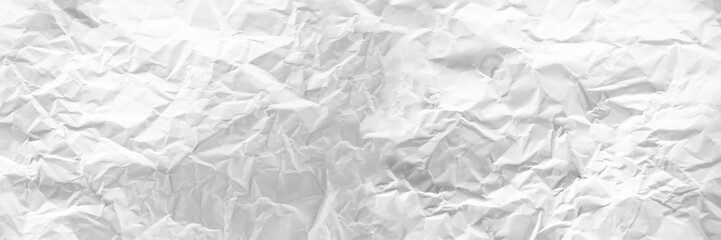 wide panorama crumpled paper texture background. crush paper so that it becomes creased and wrinkled.