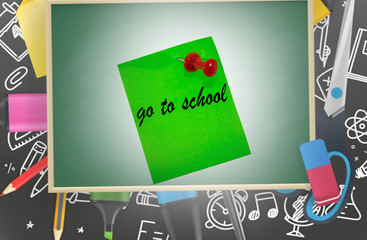 inscription go to school.  Green sticker  with a pin on a blackboard.  Education concept.Digital editing.