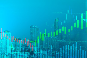 Naklejka na ściany i meble double exposure cityscape view and candlestick with fibonacci indicator graph on green background color concept, financial chart or business growth graph concept, copy space at left