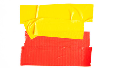 Set of red yellow tapes on white background. Torn horizontal and different size sticky tape, adhesive pieces.
