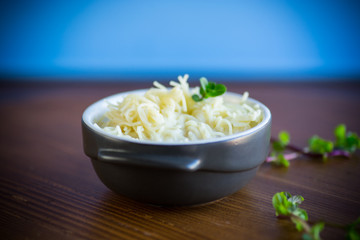 sweet boiled vermicelli with milk in a ceramic bowl