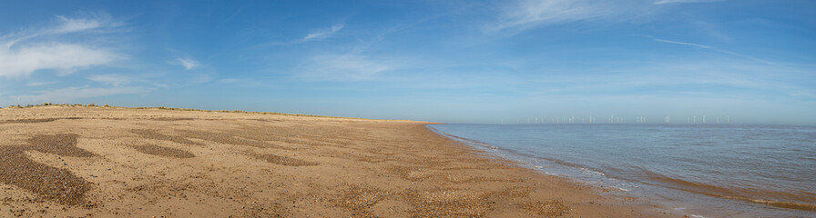Sand dunes and sea panorama.