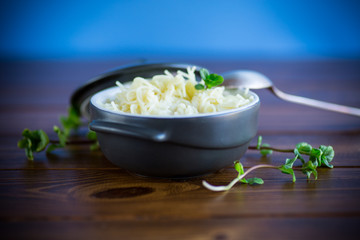 sweet boiled vermicelli with milk in a ceramic bowl